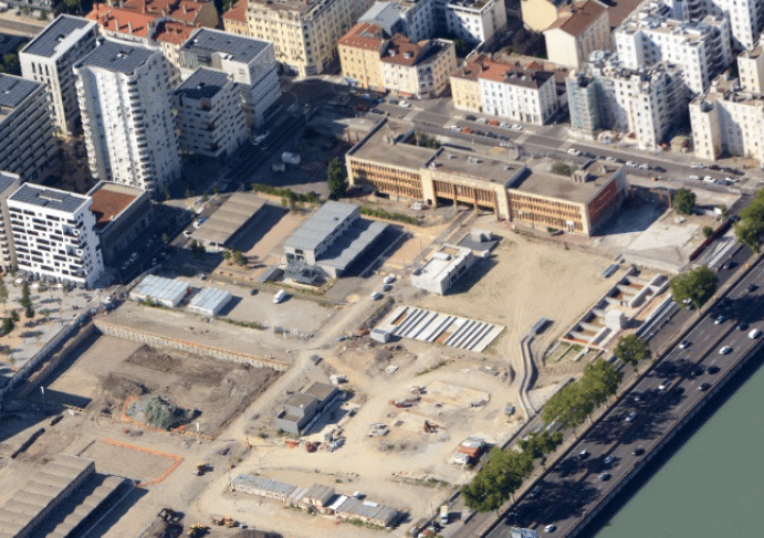 Quartier Confluence : transformation de la plus longue halle de l’ex-marché de gros en groupe scolaire et en crèche